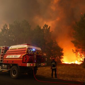 Thousands flee wildfires in France and Spain as temperatures reach extreme levels in southern Europe